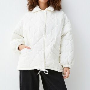 Grip & Co (sold by Simons) oversized white wavy topstitching quilted coat NWT